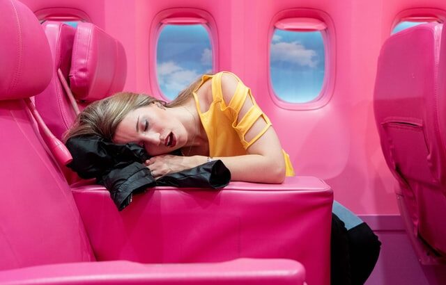 how to avoid snoring on a plane